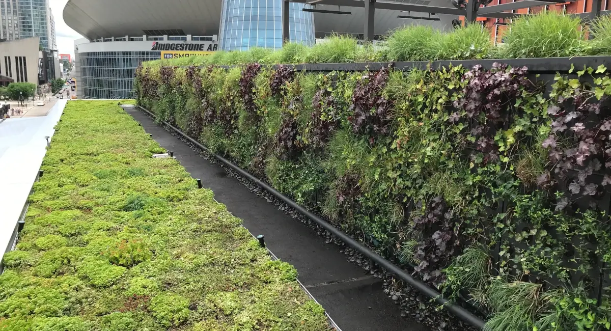 Green wall outside of technology retail company