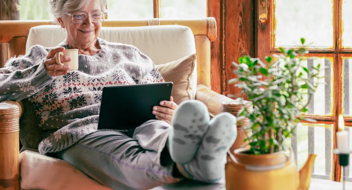image-banner-stock-old-senior-woman-sitting-at-home-on-armchair-1349143590.webp