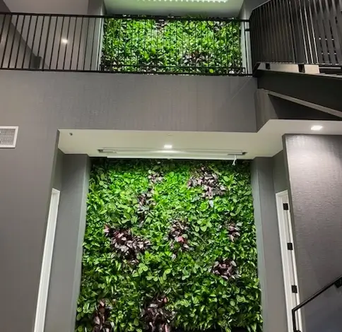 Two story green wall