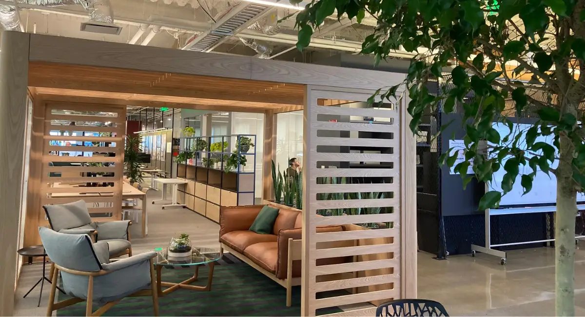 a room filled with lots of furniture and plants