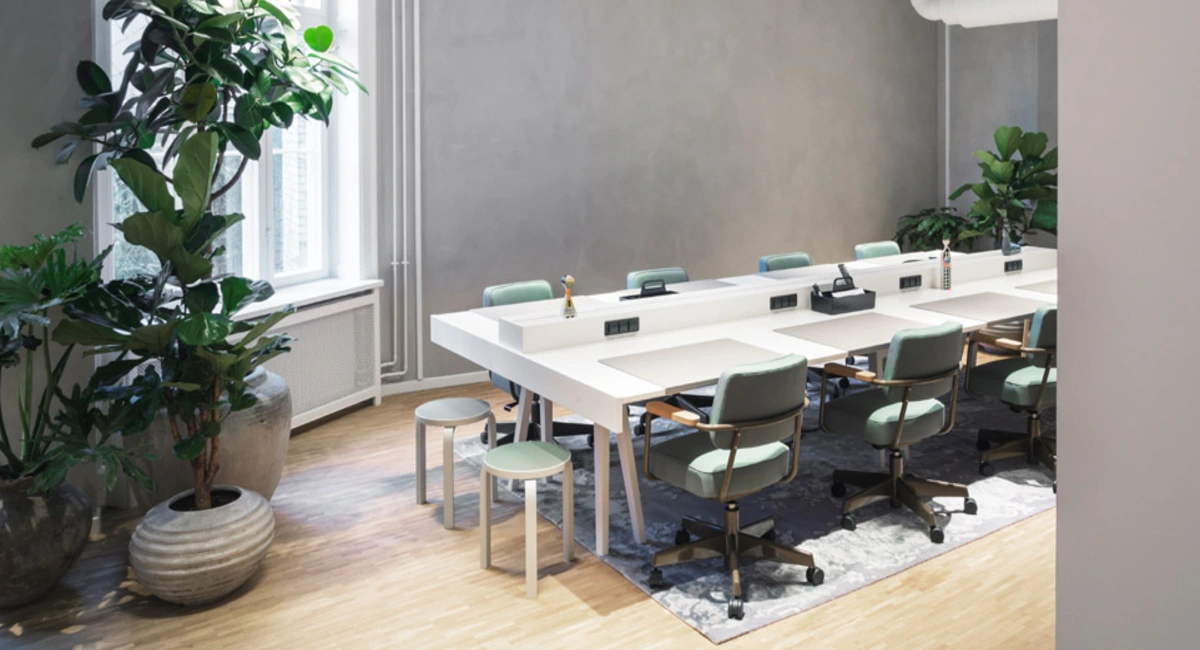 A meeting space with perfectly placed containerized plants.
