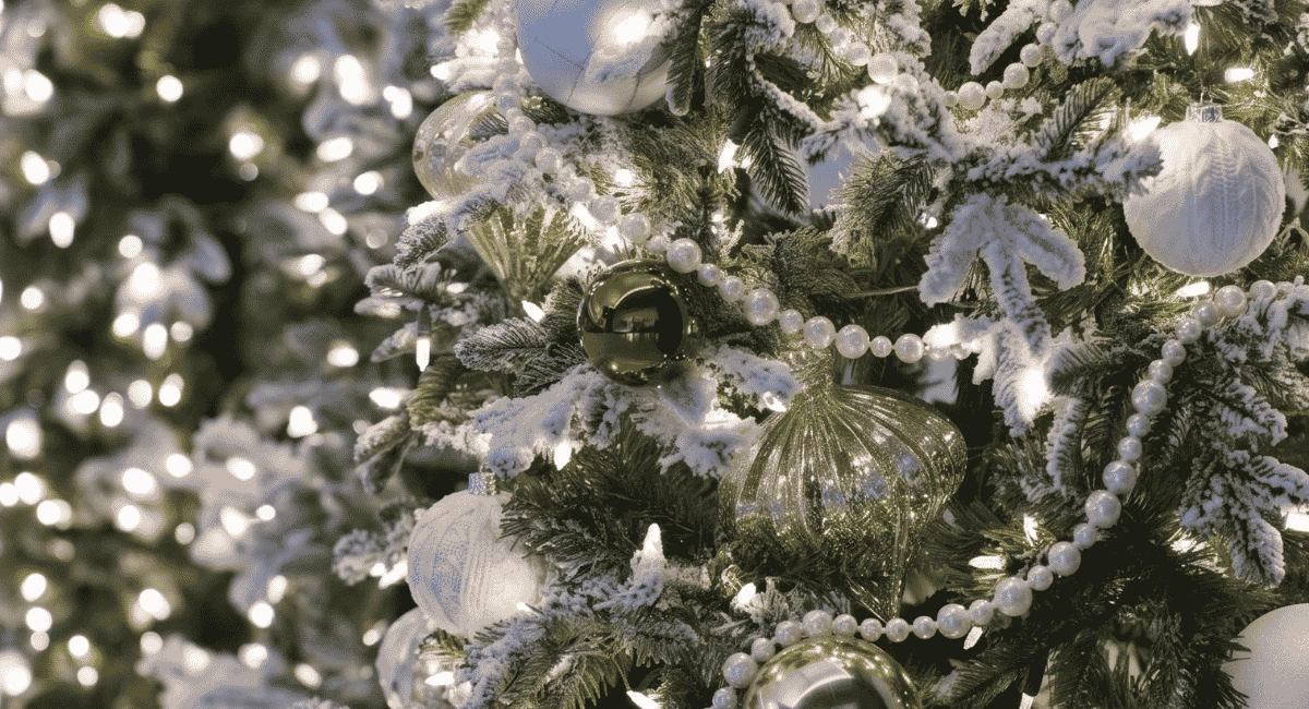 The Winter Radiance holiday design trend on a Christmas tree.