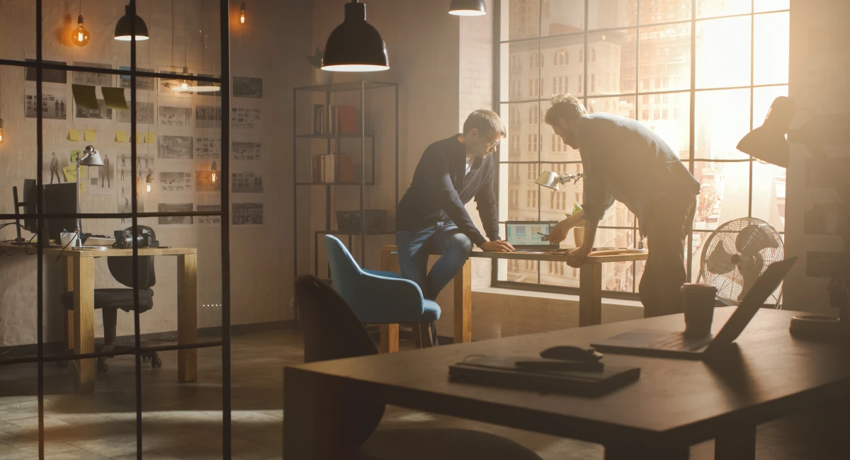image-banner-stock-two-young-and-handsome-designers-sit-on-the-desk-1199435161.webp