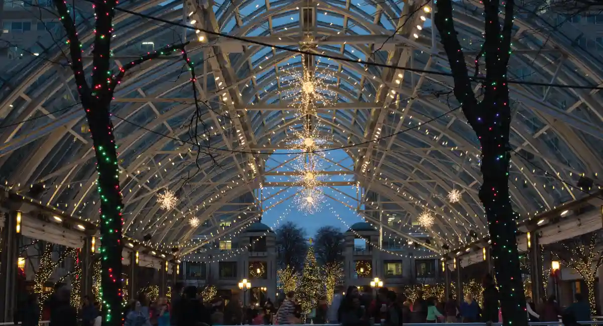 Christmas lights dangling on a ceiling