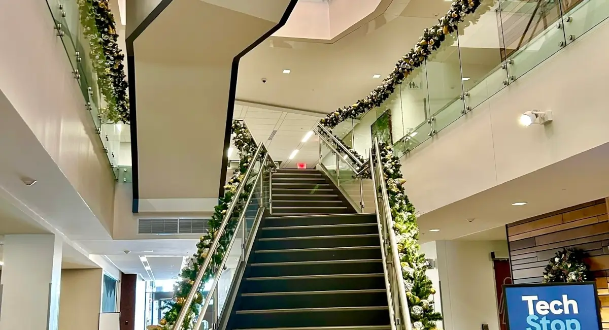 Stairs lined with lit garland