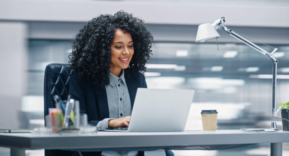 image-banner-stock-modern-office--black-businesswoman-sitting-at-her-1365824279.webp