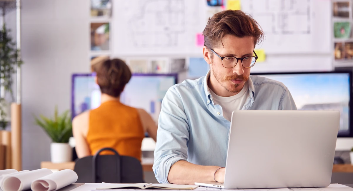 image-banner-stock-male-and-female-architects-in-office-working-at-1317442297.webp