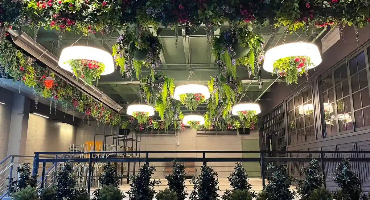 Replica plants in circular light fixtures